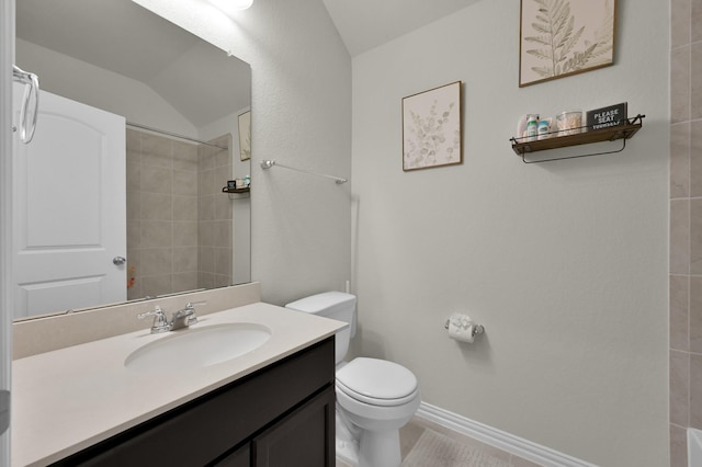 full bath featuring toilet, vanity, walk in shower, baseboards, and lofted ceiling
