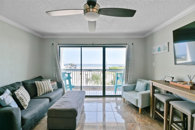 6102 Seawall Blvd Unit 155, Galveston, TX 77551 - living area with a ceiling fan, ornamental molding, and a textured ceiling