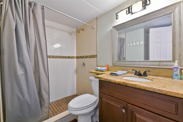 6102 Seawall Blvd Unit 155, Galveston, TX 77551 - bathroom with a shower stall, toilet, and vanity
