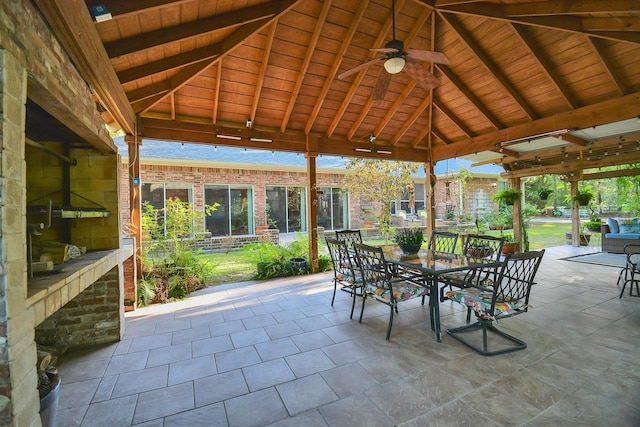 view of patio / terrace with a gazebo, outdoor dining space, and ceiling fan