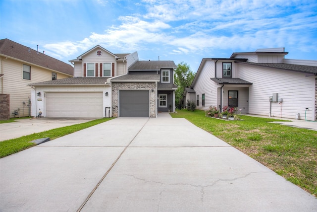 279 Capetown, Conroe, TX 77356 - view of front of house featuring concrete driveway, a shingled roof, a front lawn, and an attached garage