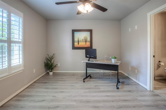 279 Capetown, Conroe, TX 77356 - office area featuring ceiling fan, wood finished floors, and baseboards
