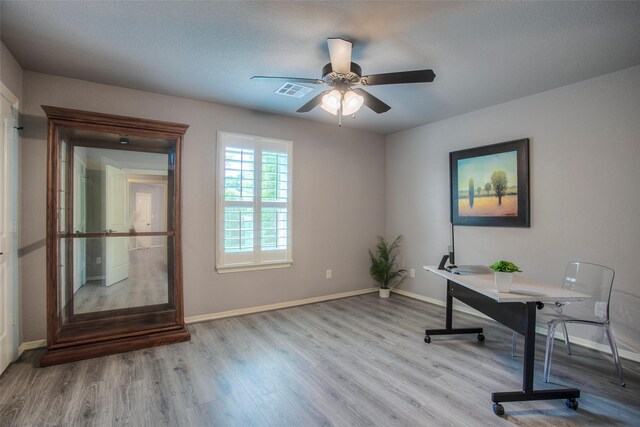 279 Capetown, Conroe, TX 77356 - office area with wood finished floors, baseboards, and ceiling fan