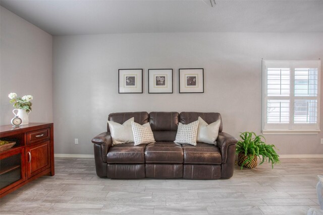 279 Capetown, Conroe, TX 77356 - living room featuring light wood finished floors and baseboards