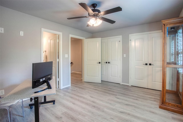 279 Capetown, Conroe, TX 77356 - unfurnished office featuring light wood finished floors, a ceiling fan, and baseboards