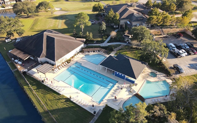 279 Capetown, Conroe, TX 77356 - bird's eye view of a pool area and a local golf course