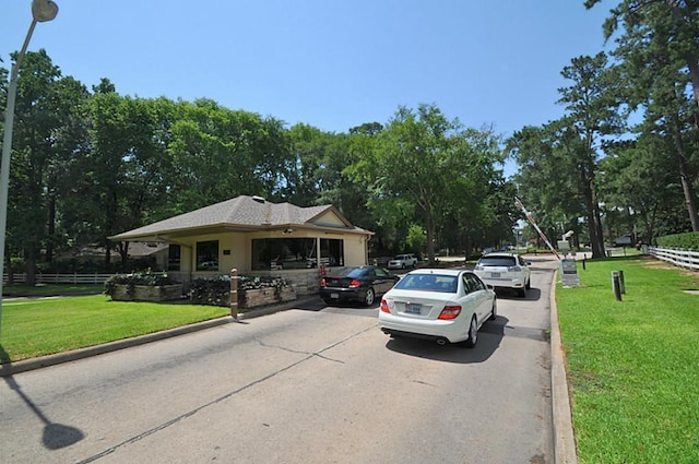 279 Capetown, Conroe, TX 77356 - view of front of home featuring driveway