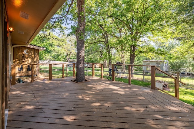 5233 N US Highway 183, Gonzales, TX 78629 - wooden terrace with an outbuilding and a fenced backyard