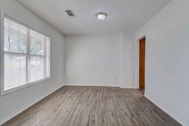27 Westwood Dr W, Trinity, TX 75862 - unfurnished room featuring wood finished floors and baseboards
