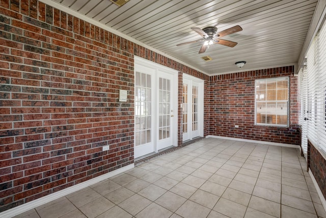 27 Westwood Dr W, Trinity, TX 75862 - unfurnished sunroom with a ceiling fan and french doors
