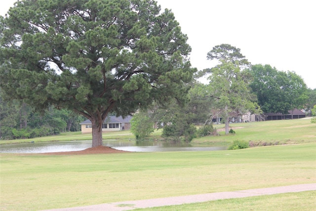 27 Westwood Dr W, Trinity, TX 75862 - surrounding community featuring a water view, a yard, and view of golf course