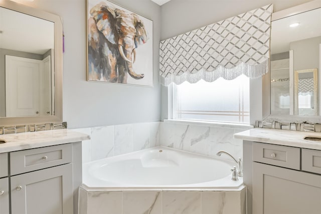 12107 Allington Cove Ln, Humble, TX 77346 - bathroom with a bath and vanity