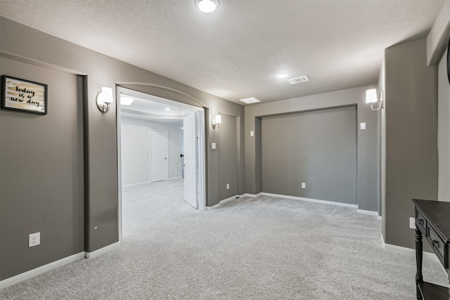 12107 Allington Cove Ln, Humble, TX 77346 - interior space featuring light colored carpet, baseboards, and visible vents