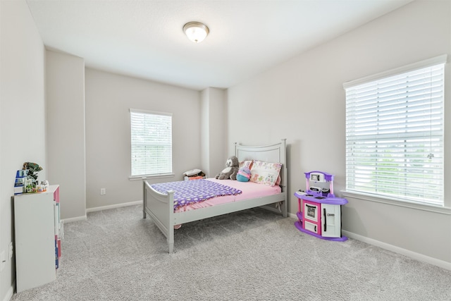 12107 Allington Cove Ln, Humble, TX 77346 - carpeted bedroom featuring baseboards