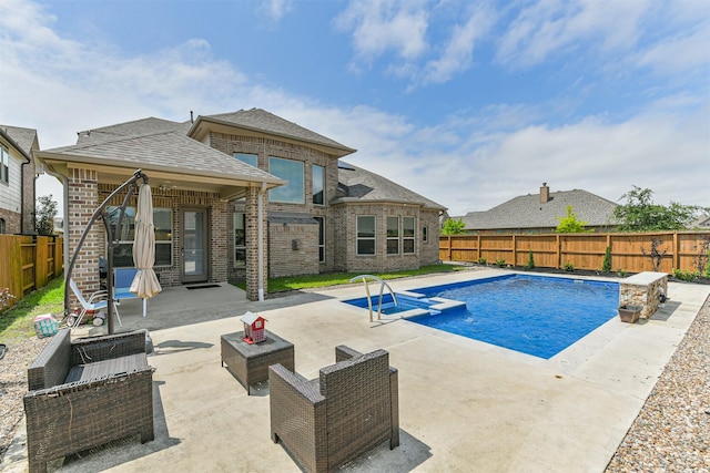 12107 Allington Cove Ln, Humble, TX 77346 - view of swimming pool with a patio area, a fenced backyard, and a fenced in pool