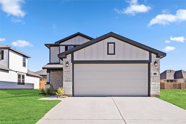 1200 Haverford Ln, Dayton, TX 77535 - view of front of property with an attached garage, driveway, board and batten siding, and a front yard