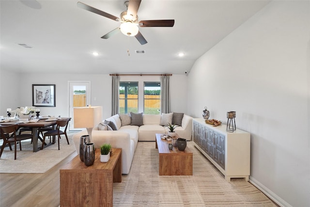 804 Timmons Ln, Dayton, TX 77535 - living area with plenty of natural light, a ceiling fan, and visible vents