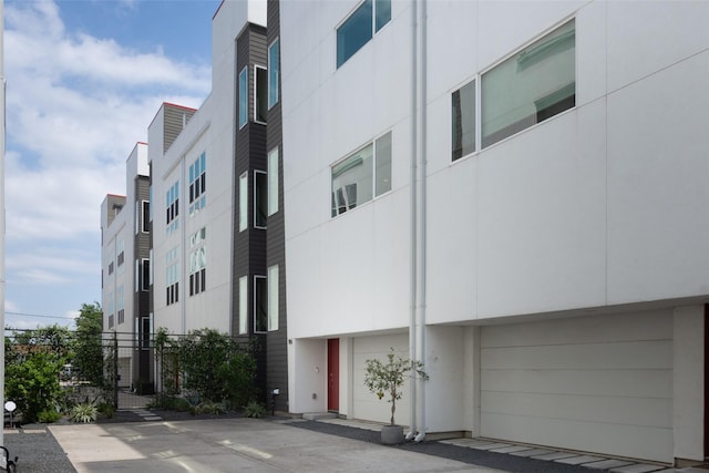 view of building exterior featuring an attached garage