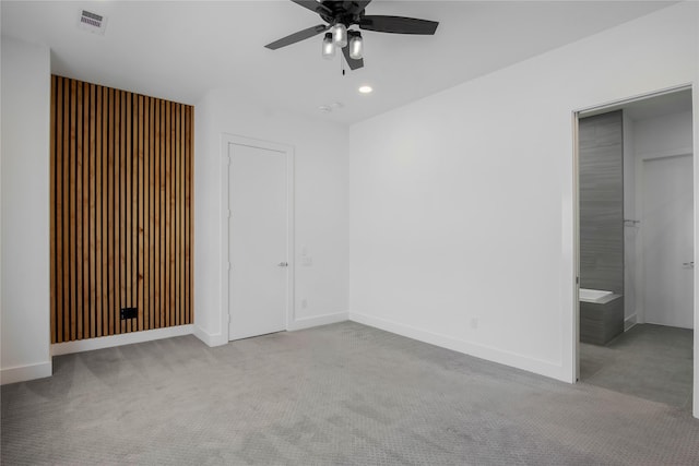 unfurnished bedroom featuring recessed lighting, visible vents, a ceiling fan, carpet floors, and baseboards