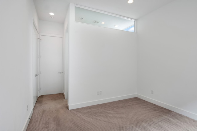 1155 W 18th St, Houston, TX 77008 - empty room featuring carpet, recessed lighting, and baseboards