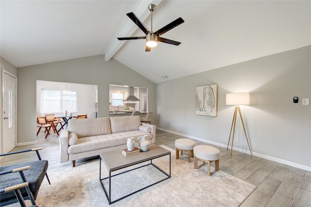 17434 Jolly Boat Dr, Crosby, TX 77532 - living room featuring a ceiling fan, light wood finished floors, and baseboards