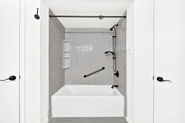 full bath with shower / bathing tub combination and baseboards
