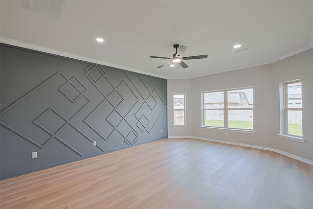 2006 Deer Vly, Missouri City, TX 77459 - empty room with a ceiling fan, visible vents, plenty of natural light, and wood finished floors