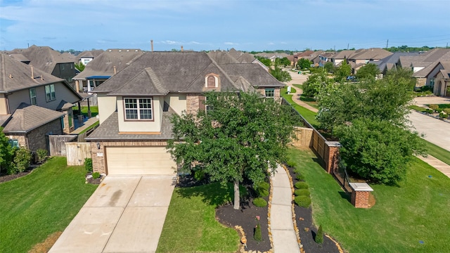2006 Deer Vly, Missouri City, TX 77459 - french country home with a residential view, a shingled roof, brick siding, stucco siding, and concrete driveway