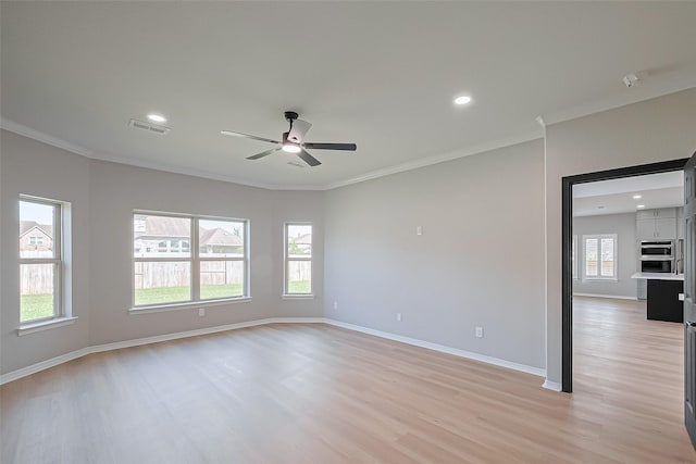 2006 Deer Vly, Missouri City, TX 77459 - spare room with visible vents, ornamental molding, and a wealth of natural light