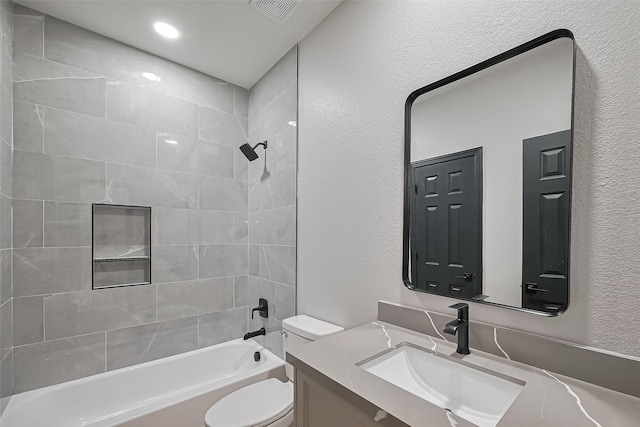 2006 Deer Vly, Missouri City, TX 77459 - bathroom with a textured wall, vanity, toilet, tub / shower combination, and visible vents