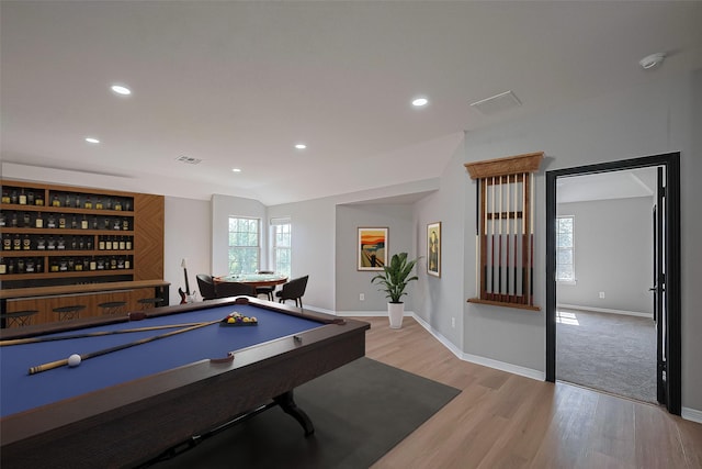 2006 Deer Vly, Missouri City, TX 77459 - rec room featuring recessed lighting, baseboards, a bar, and light wood-type flooring