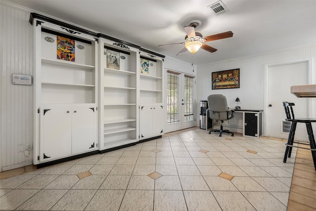 office with light tile patterned flooring, visible vents, built in features, a ceiling fan, and ornamental molding