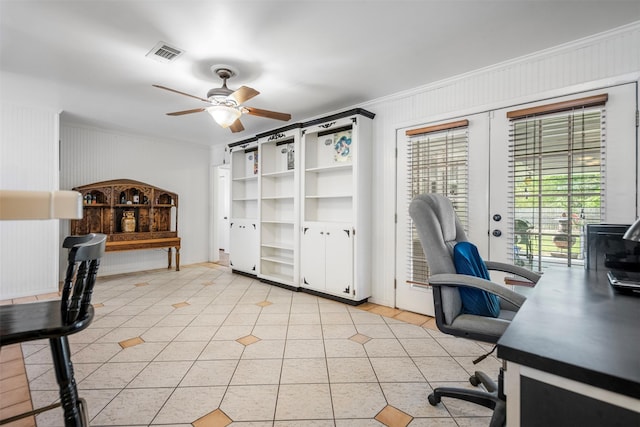 office area featuring light tile patterned floors, ceiling fan, visible vents, and ornamental molding