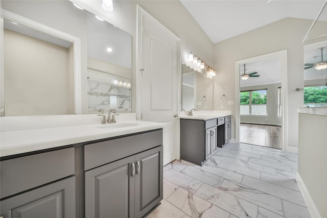29167 Turning Springs Ln, Fulshear, TX 77441 - bathroom with a ceiling fan, a sink, marble finish floor, baseboards, and two vanities