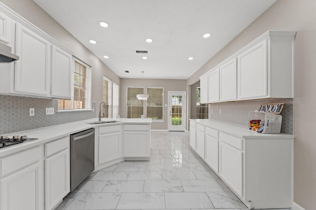 15306 Goodman St, Houston, TX 77084 - kitchen with a sink, stainless steel dishwasher, recessed lighting, light marble finish floors, and a peninsula