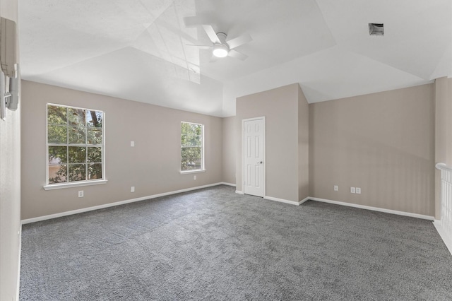 15306 Goodman St, Houston, TX 77084 - carpeted empty room with a ceiling fan, lofted ceiling, healthy amount of natural light, and baseboards