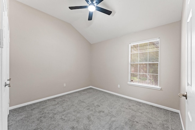15306 Goodman St, Houston, TX 77084 - carpeted empty room featuring a ceiling fan, vaulted ceiling, and baseboards