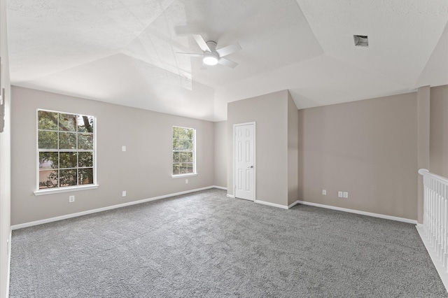 15306 Goodman St, Houston, TX 77084 - unfurnished room featuring ceiling fan, lofted ceiling, carpet floors, and baseboards
