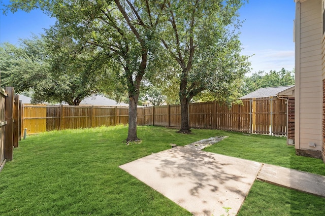 15306 Goodman St, Houston, TX 77084 - view of yard featuring a patio area