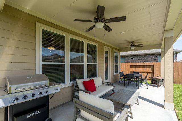 7702 Royal Oasis Ln, Cypress, TX 77433 - view of patio / terrace with fence, an outdoor hangout area, ceiling fan, grilling area, and outdoor dining space