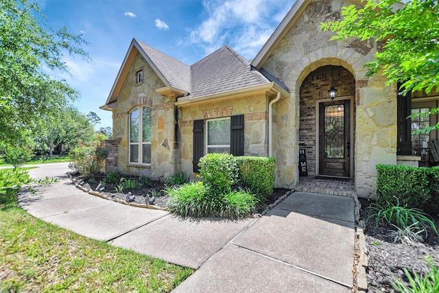 12603 Mostyn Ct, Magnolia, TX 77354 - view of exterior entry featuring stone siding