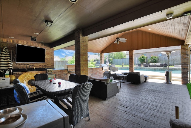 12603 Mostyn Ct, Magnolia, TX 77354 - view of patio / terrace featuring fence, area for grilling, a fenced in pool, a ceiling fan, and outdoor dining area