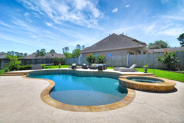 12603 Mostyn Ct, Magnolia, TX 77354 - view of pool with a yard, a trampoline, a patio area, and a fenced backyard