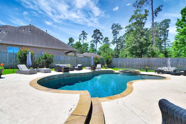 12603 Mostyn Ct, Magnolia, TX 77354 - view of pool with an outdoor hangout area, a patio, a pool with connected hot tub, and a fenced backyard
