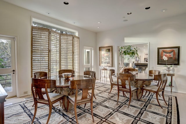 2003 Arrowwood Cir N, Houston, TX 77063 - dining room featuring baseboards, recessed lighting, and light tile patterned floors