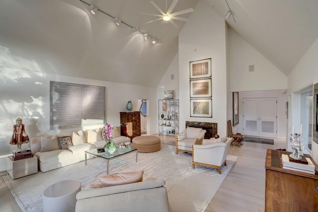 2003 Arrowwood Cir N, Houston, TX 77063 - living area with high vaulted ceiling, rail lighting, and wood finished floors