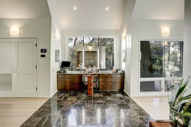 2003 Arrowwood Cir N, Houston, TX 77063 - bathroom with lofted ceiling, marble finish floor, vanity, and baseboards