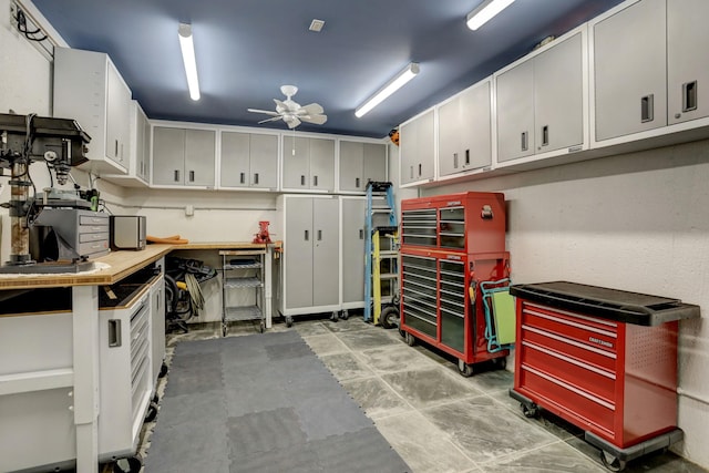 2003 Arrowwood Cir N, Houston, TX 77063 - garage with a workshop area and ceiling fan