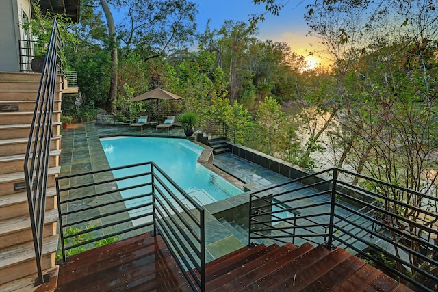 2003 Arrowwood Cir N, Houston, TX 77063 - view of pool with stairs and a fenced in pool