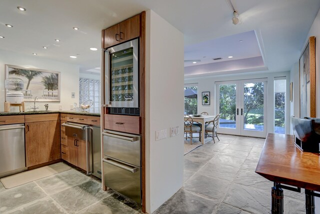 2003 Arrowwood Cir N, Houston, TX 77063 - bar with recessed lighting, stainless steel dishwasher, a sink, french doors, and wine cooler